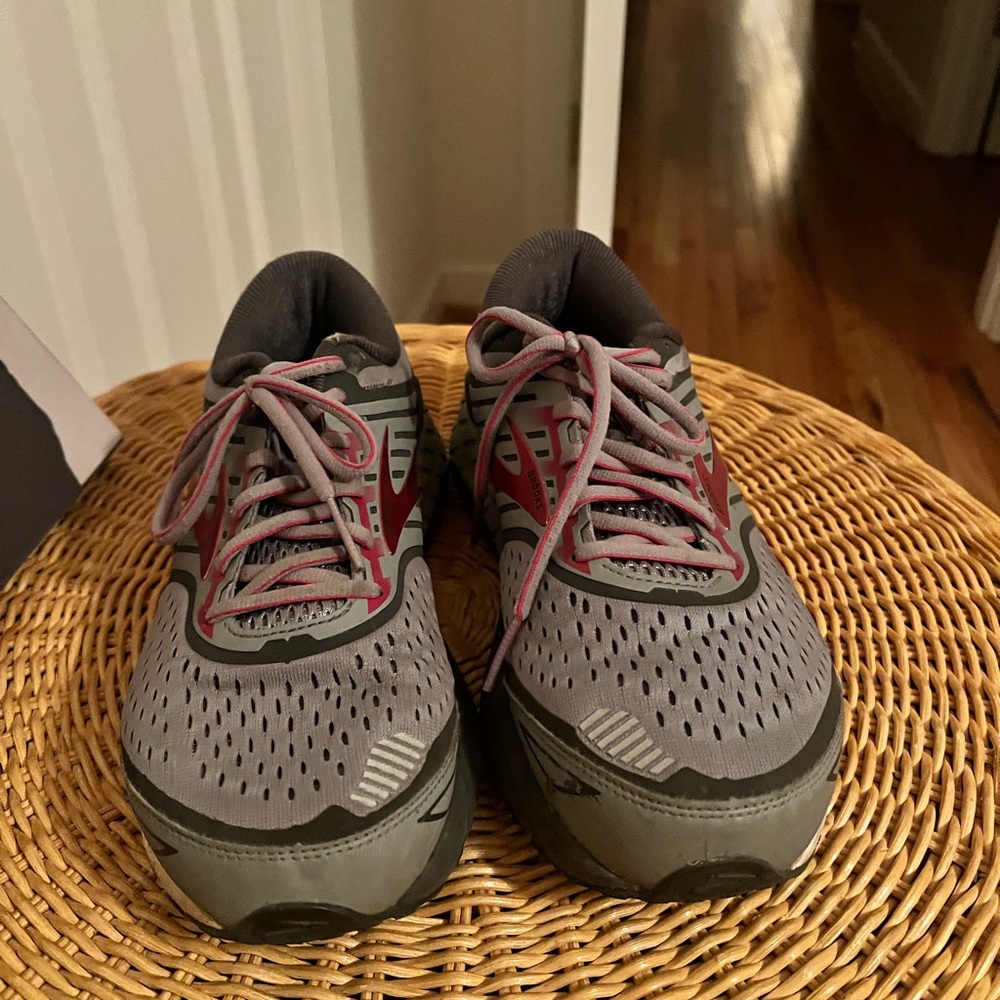Gray and Red Athletic Shoes